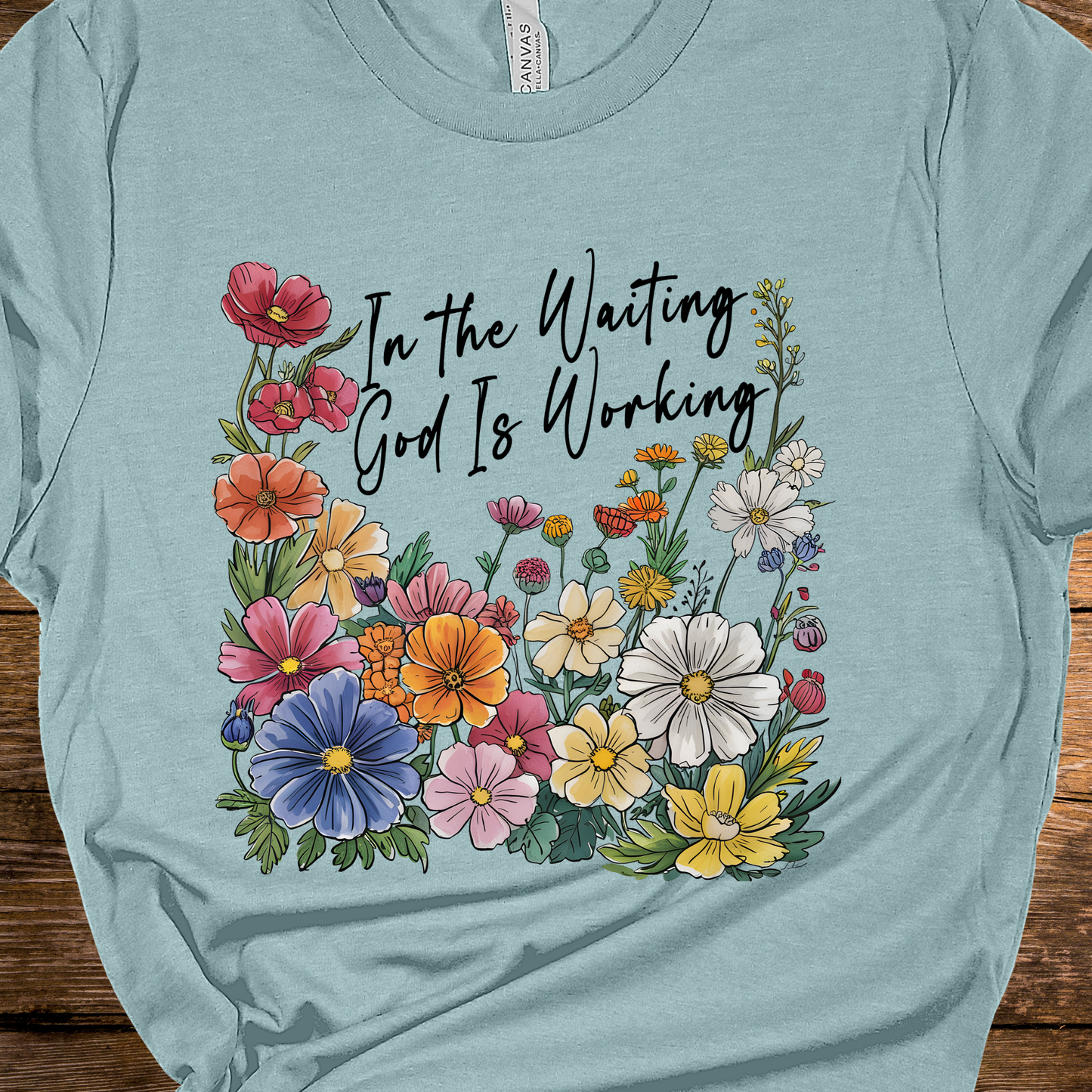 God is Working Graphic Tee